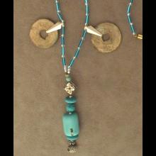 Collier avec deux pi�ces en bronze Song